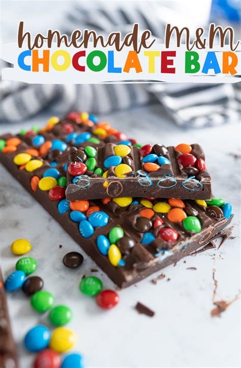 homemade m & m chocolate bar with colorful candy on top and text ...