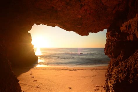 Praia Dona Ana | Sunrise seen from a cavern at the Dona Ana … | Flickr