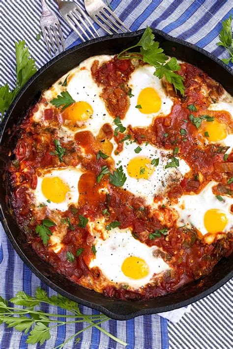 Shakshuka Recipe: Eggs baked in spicy tomato sauce with feta