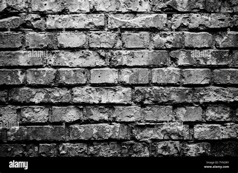 Old brick wall background. Black wallpaper Stock Photo - Alamy