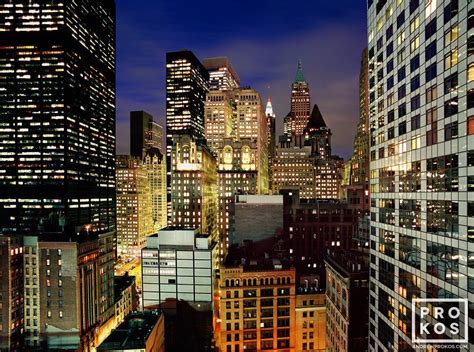 Lower Manhattan Skyscrapers at Night - Framed Photograph by Andrew Prokos