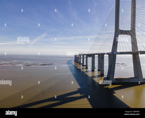 Aerial view of Vasco da Gama bridge crossing the Tagus River, one of ...