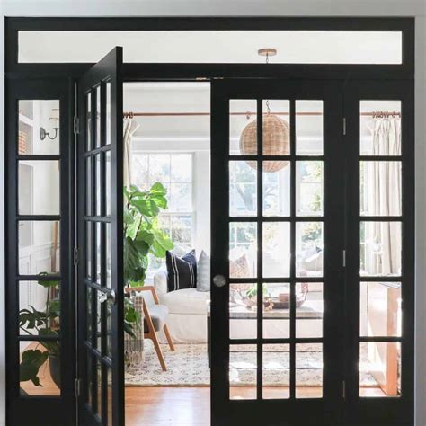 Farmhouse Living Room With Black Doors - Soul & Lane