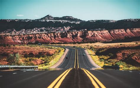 Premium Photo | Natural american landscape with asphalt road to horizon