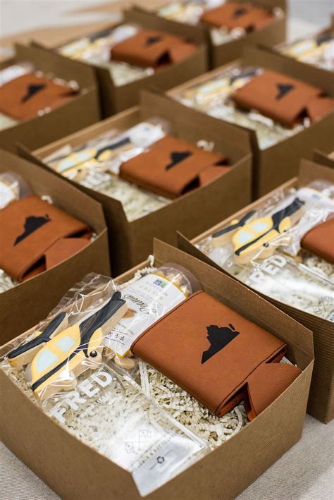 several brown boxes filled with different items on top of a table