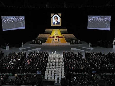 Japan's former leader Abe honored at a divisive state funeral : NPR