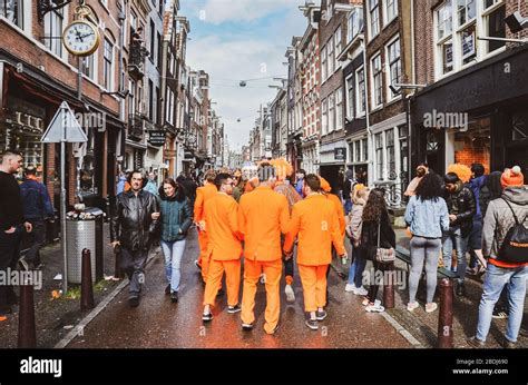 Amsterdam, Netherlands - April 27, 2019: Young people dressed in ...