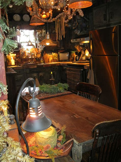 Dark woodwork, orange lights, green plants | Primitive bathrooms ...