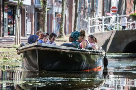 Delft: Open Boat Canal Cruise with Skipper | GetYourGuide