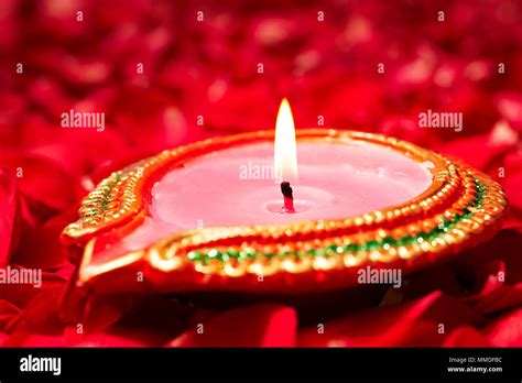 Diwali Diya Lamp - Colorful clay diya lamps lit during diwali Festival ...