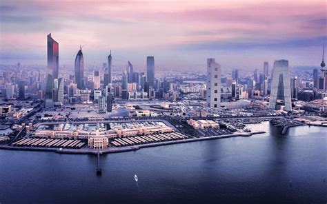 Download wallpapers Kuwait City, evening, sunset, skyscrapers, NBK ...