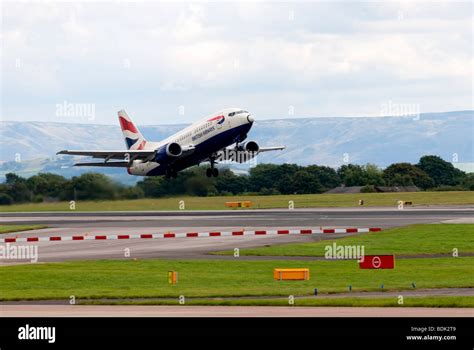 British Airways Boeing 737 takes off from Manchester Airport Stock ...