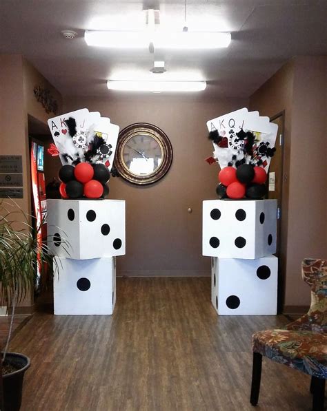 Casino theme centerpieces placed on large dice, perfect for an entry! # ...