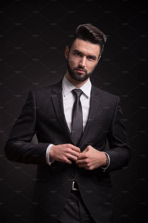 serious man suit elegant looking | People Images ~ Creative Market