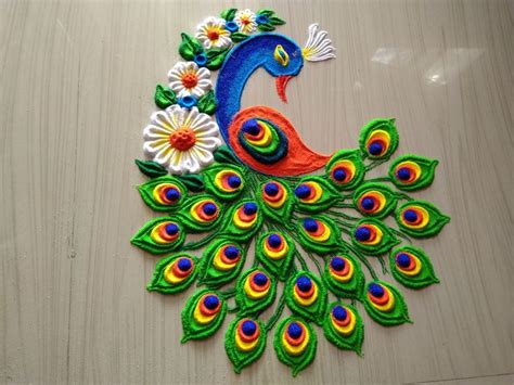 Beautiful peacock rangoli design | | Colorful rangoli designs, Rangoli ...