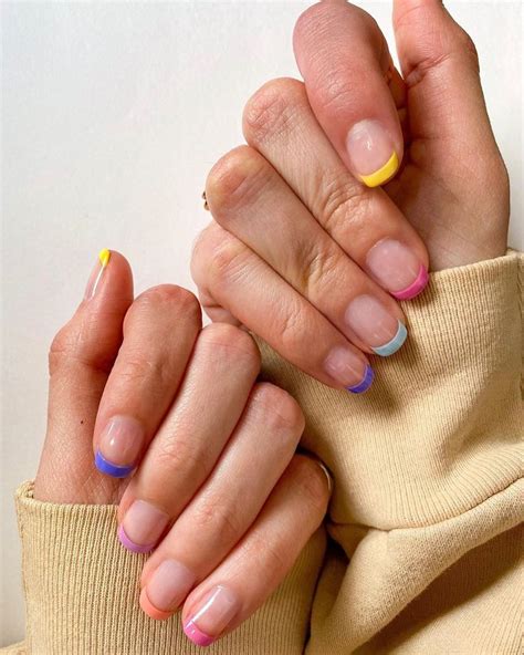 The rainbow French manicure is a new way to wear a classic French ...