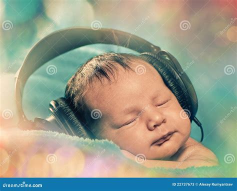 Baby with headphones stock image. Image of blue, funny - 22737673