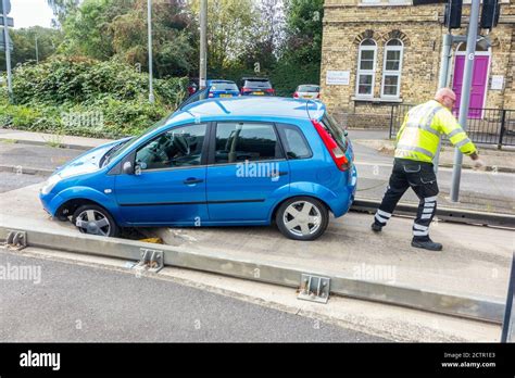 Accident car being towed away hi-res stock photography and images - Alamy