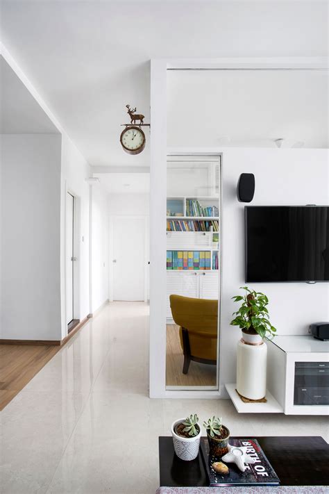 A white palette and minimal interiors maximise space in this Mumbai ...