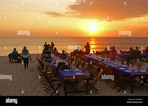 Sunset at Jimbaran Beach, Bali, Indonesia Stock Photo - Alamy