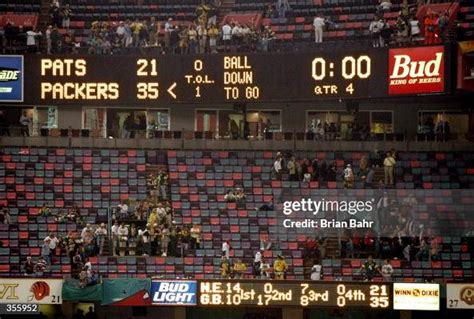 The scoreboard shows the final results of Super Bowl XXXI between the ...