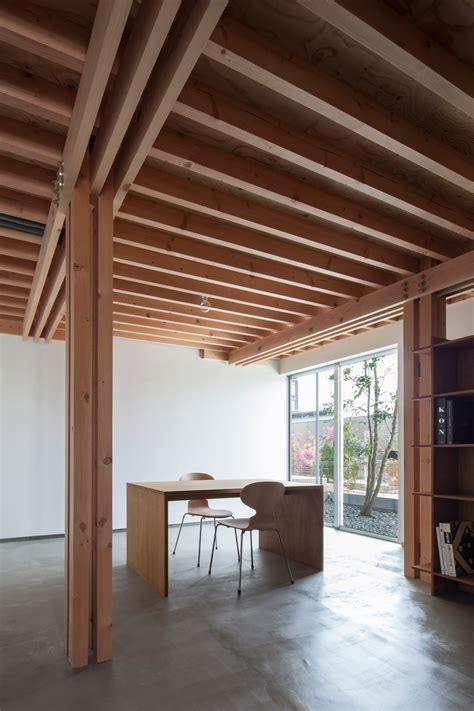 FT Architects' 4 Columns House Features A Traditional Timber Frame And ...