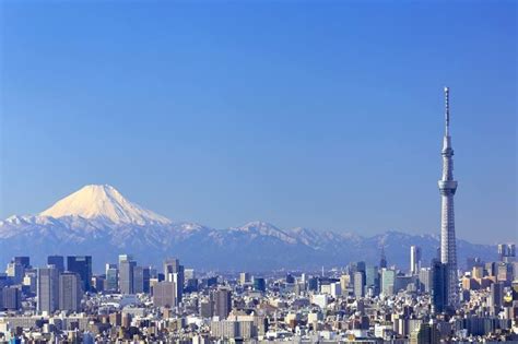 Mt Fuji looms over Tokyo. | Japan travel, Visit tokyo, Tokyo travel