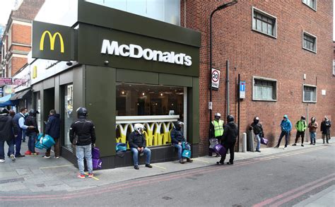 Giant lines and traffic jams form as McDonald's reopens hundreds of ...