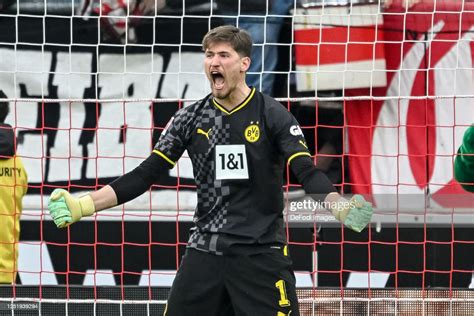 Borussia Dortmund goalkeeper being looked at by Chelsea