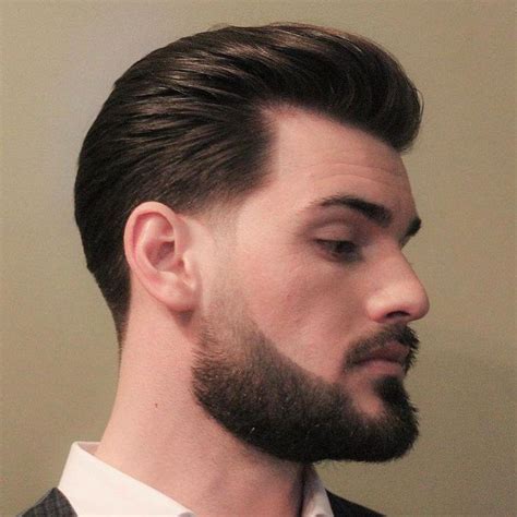 A sideburn taper adds a modern finish to this classic hair and beard ...