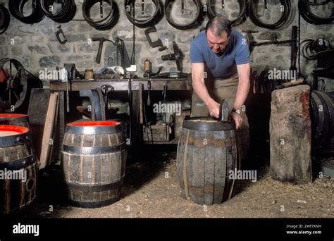 Cooper making wooden beer barrel. Clive Hollis a beer barrel maker at ...