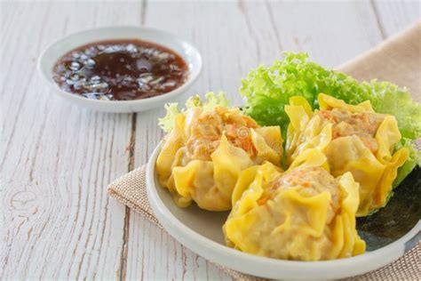 Chinese Steamed Dumpling, Shumai on White Dish Served with Soy Sauce ...