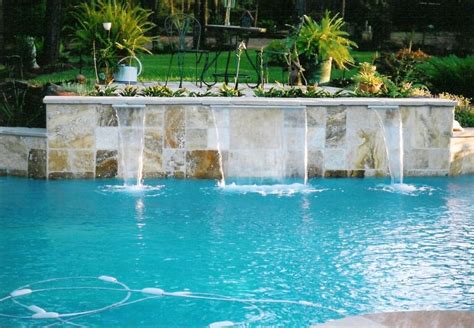 20 Exquisite Waterfalls Designs for Pools Inground