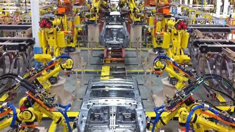 Robots Building Cars - YouTube