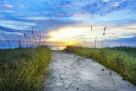 Early Morning Beach Walk Photograph by Debra and Dave Vanderlaan