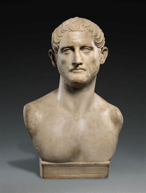 A ROMAN MARBLE PORTRAIT BUST OF A MAN, TRAJANIC, EARLY 2ND CENTURY A.D ...