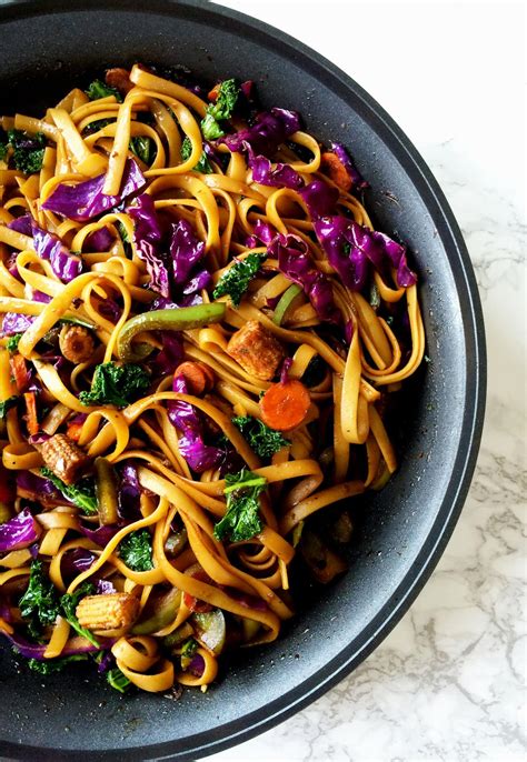 Vegan Mongolian noodles and veggies stir fry in spicy soy ginger sauce