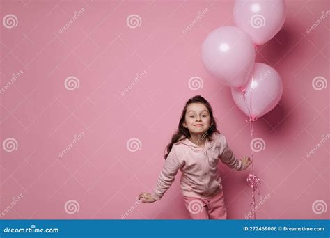 Caucasian Little Girl Holds Bunch of Inflatable Pink Pastel Balloons ...