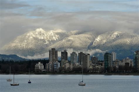 Mountains in the landscape behind the skyline of Vancouver, Canada ...