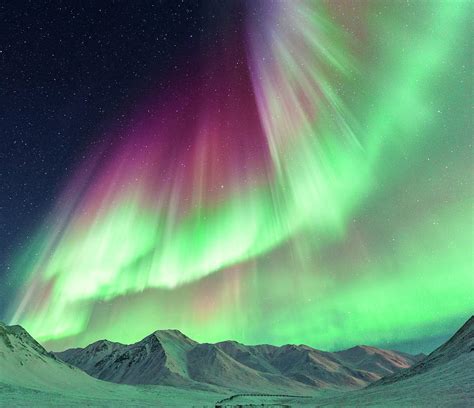 Aurora Borealis In Alaska by Noppawat Tom Charoensinphon