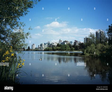 LOST LAGOON in STANLEY PARK with high rise buildings of Downtown ...