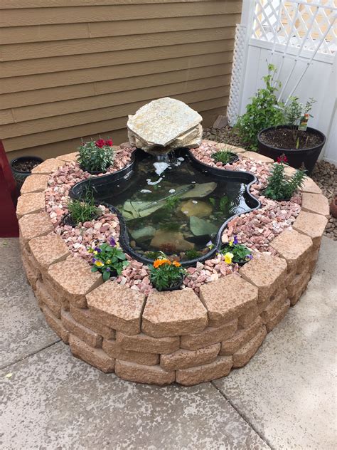 Above ground pond using garden wall blocks! #patio #pond #fish #summer ...