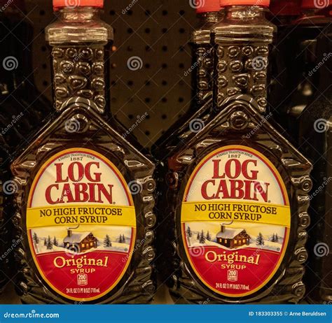 Bottles of Log Cabin Syrup editorial image. Image of shop - 183303355