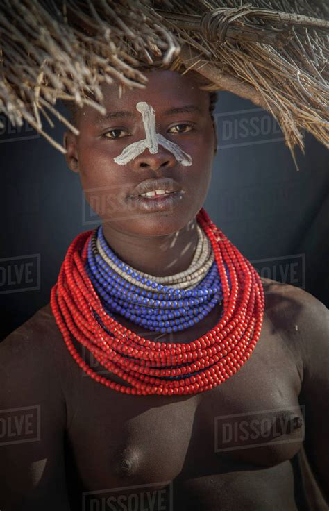 Woman of the Karo Tribe , Omo Valley, Ethiopia - Stock Photo - Dissolve