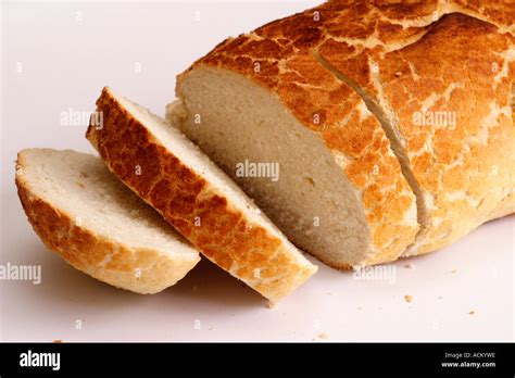 Sliced tiger loaf bread on a white background Stock Photo, Royalty Free ...