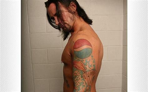 Why does CM Punk have a Pepsi tattoo?