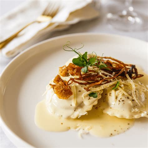 Pansotti in Parmesan Cream Sauce, topped with crispy Enoki mushrooms ...