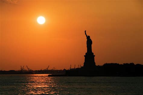 Statue Of Liberty At Sunset, Seen From by Rachel Lewis