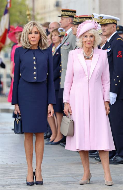 Brigitte Macron Dons Nautical Suit to Meet Queen Camilla in Pink Dress