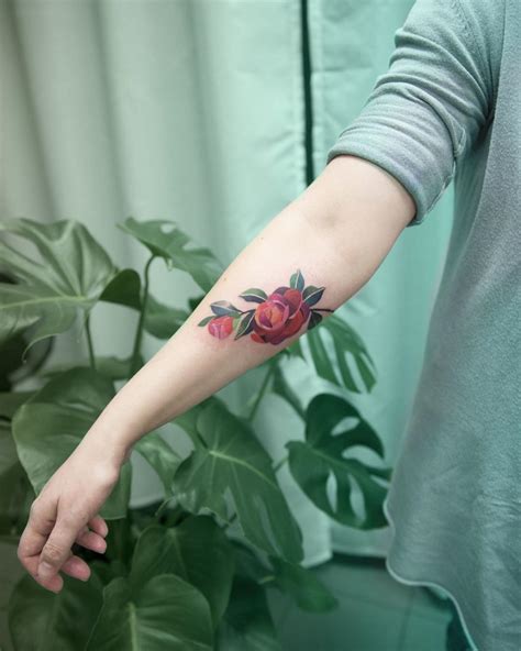 Camellia flower tattoo by Mavka Leesova - Tattoogrid.net